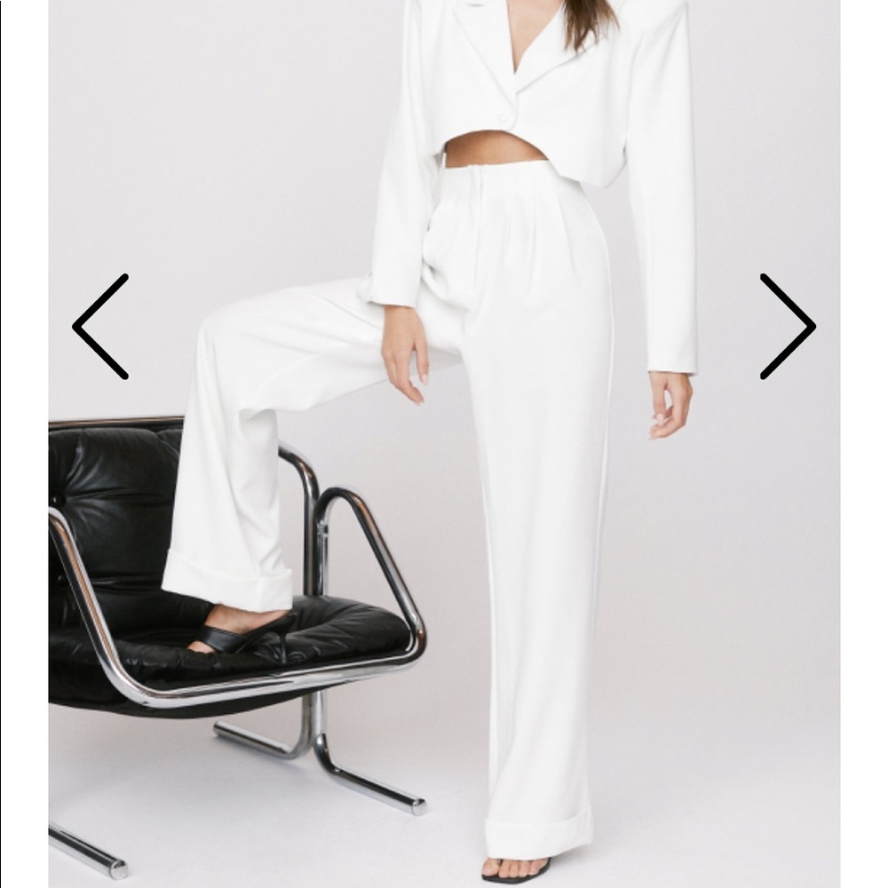 TAGS ON White high waisted trousers. Emrata!!